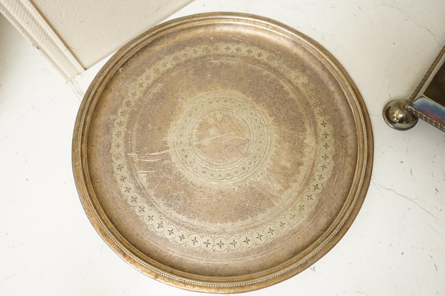 A Victorian silver plated urn, height 42cm, a silver plated spirit kettle and two circular dishes.